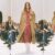 Celine cowboy boots on the Fall 2026 runway: dark brown pointed boots with a cream skirt and black jacket, white mid-calf boots under a camel trench and red sequin dress, and white boots with an animal-print jacket and red skirt (looks 11, 32 and 9)