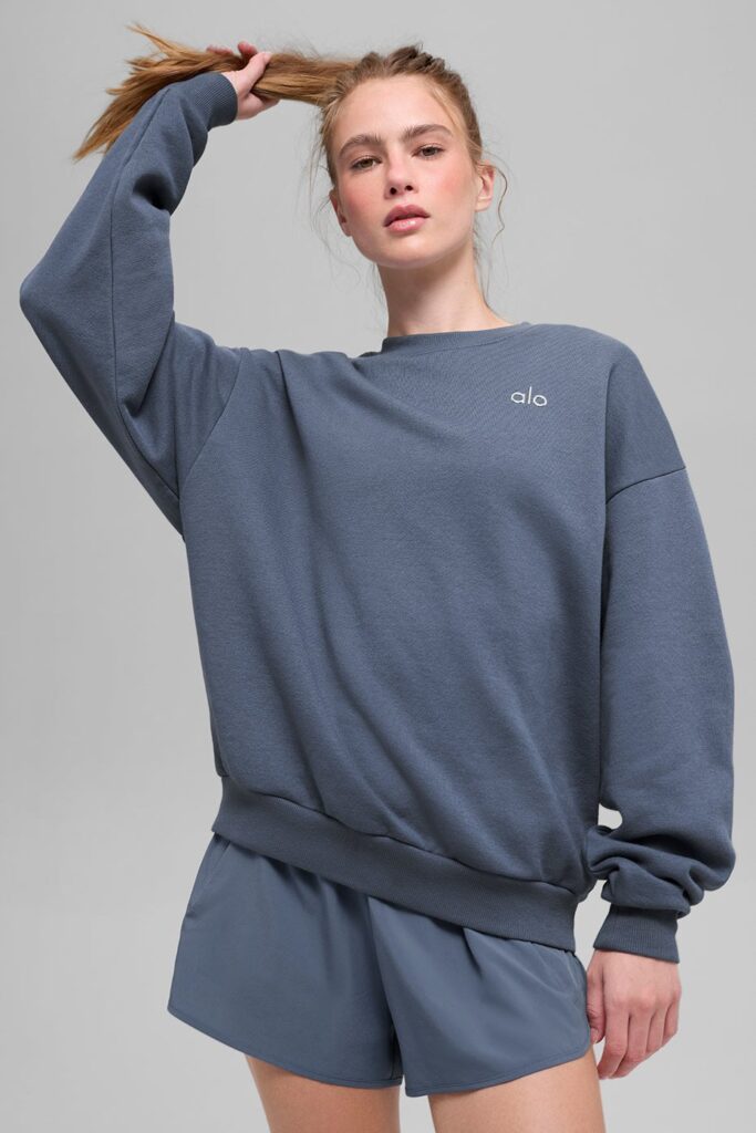 Alo Accolade Crew Neck Pullover in bluestone French terry with dropped shoulders and a small chrome Alo logo