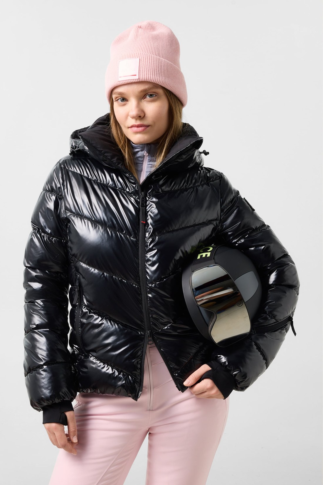 Model wearing the Bogner Fire+Ice Saelly shiny black ski jacket