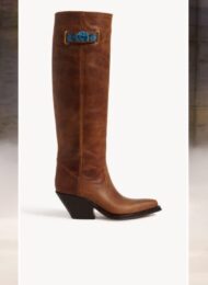 Chloé cowboy boots for fall 2026: a tiered check skirt with brown boots on the runway, the Chloé Azelan Western boot in amber brown, and a plaid tiered dress with boots
