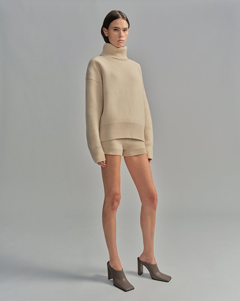 Cordova Dauphine merino-cashmere knit sweater and short set for apres ski outfits