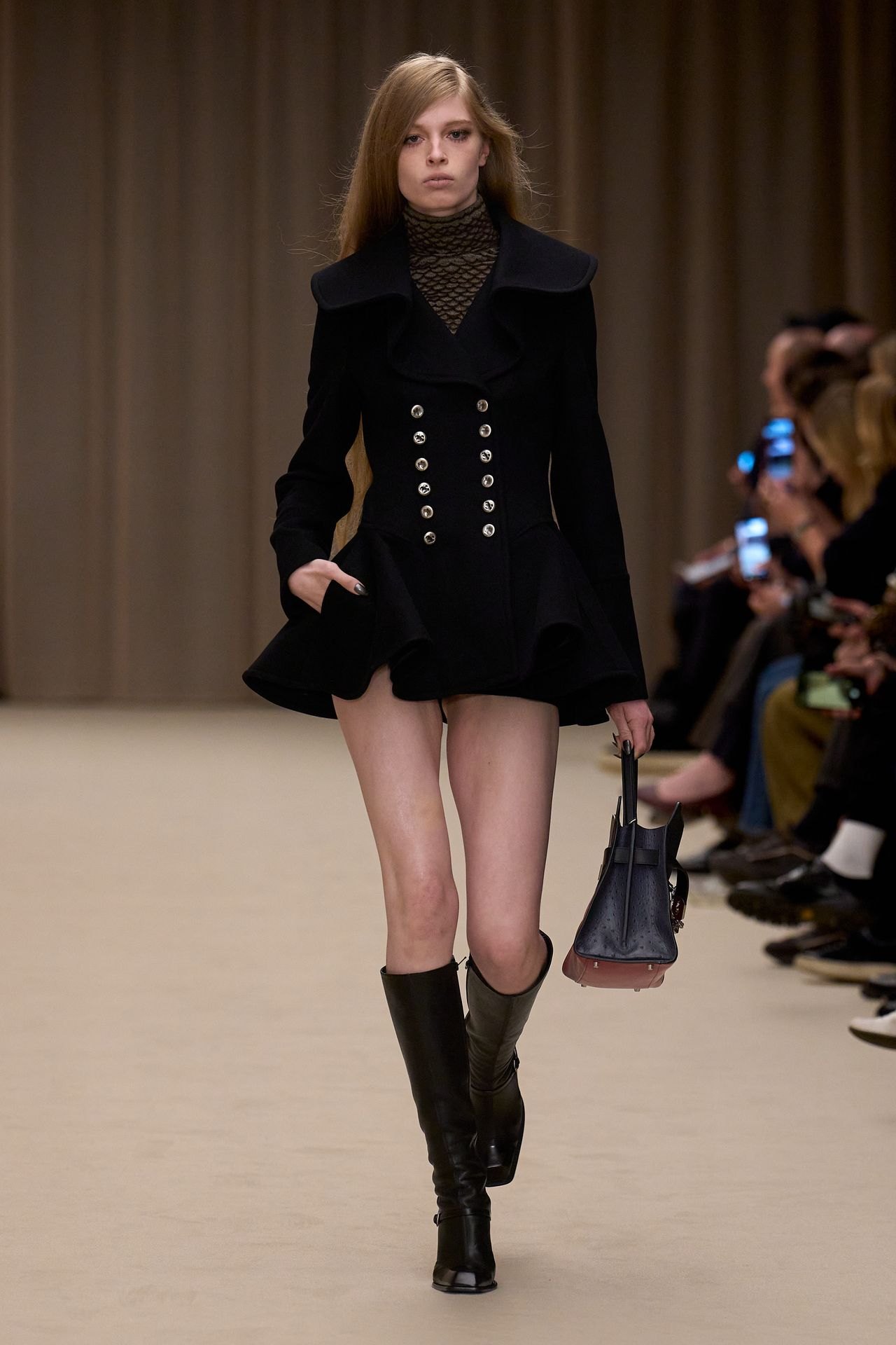 McQueen Fall 2026 look 3: black multi-button jacket with knee-high boots
