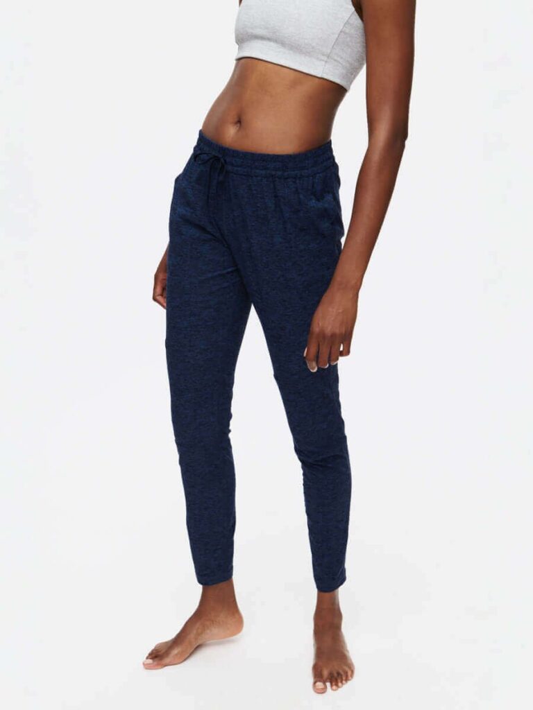 Outdoor Voices CloudKnit Sweatpant in navy, a mid-rise jogger with side pockets and a drawstring waist