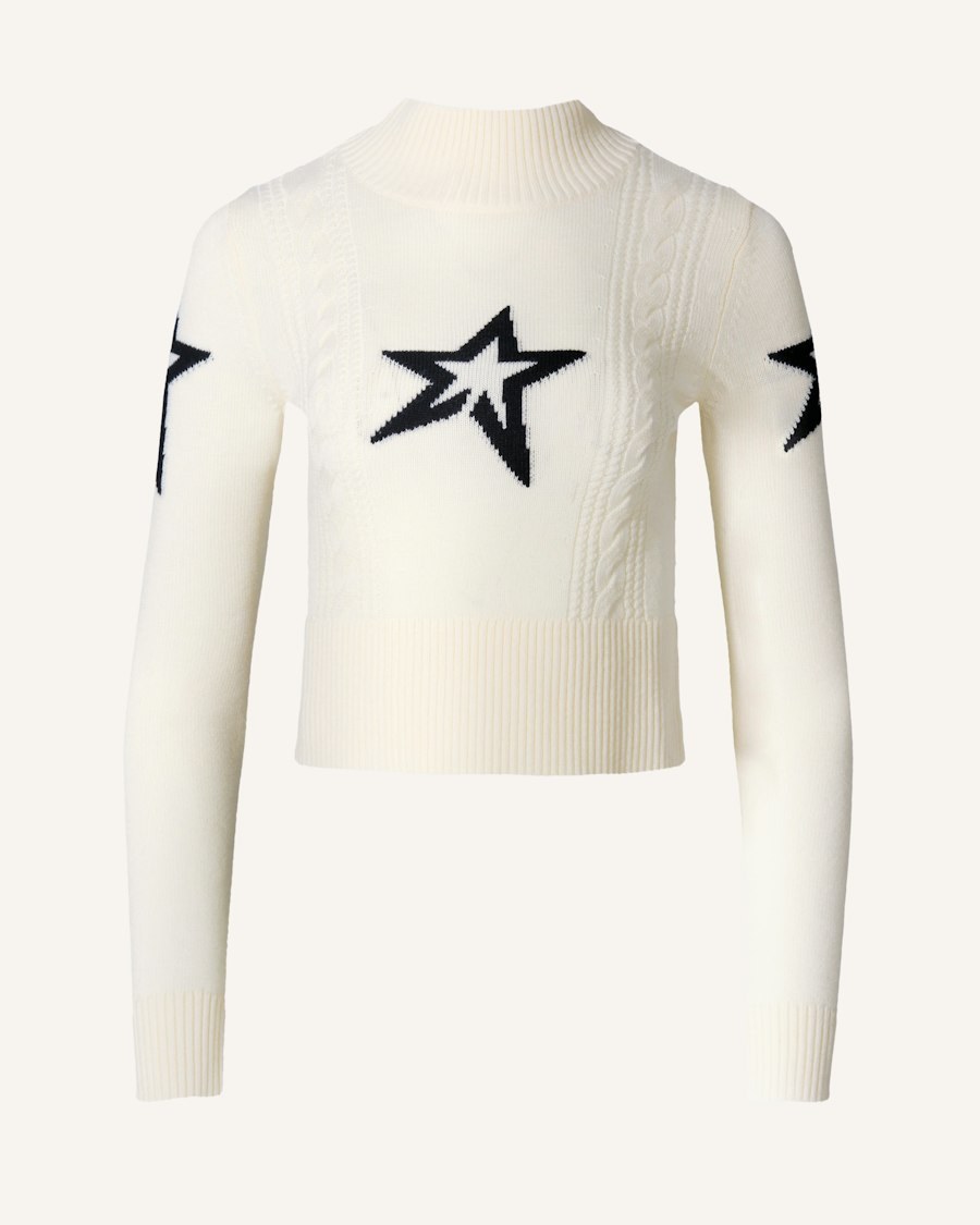 Perfect Moment cable merino sweater in cream with a navy star on the chest